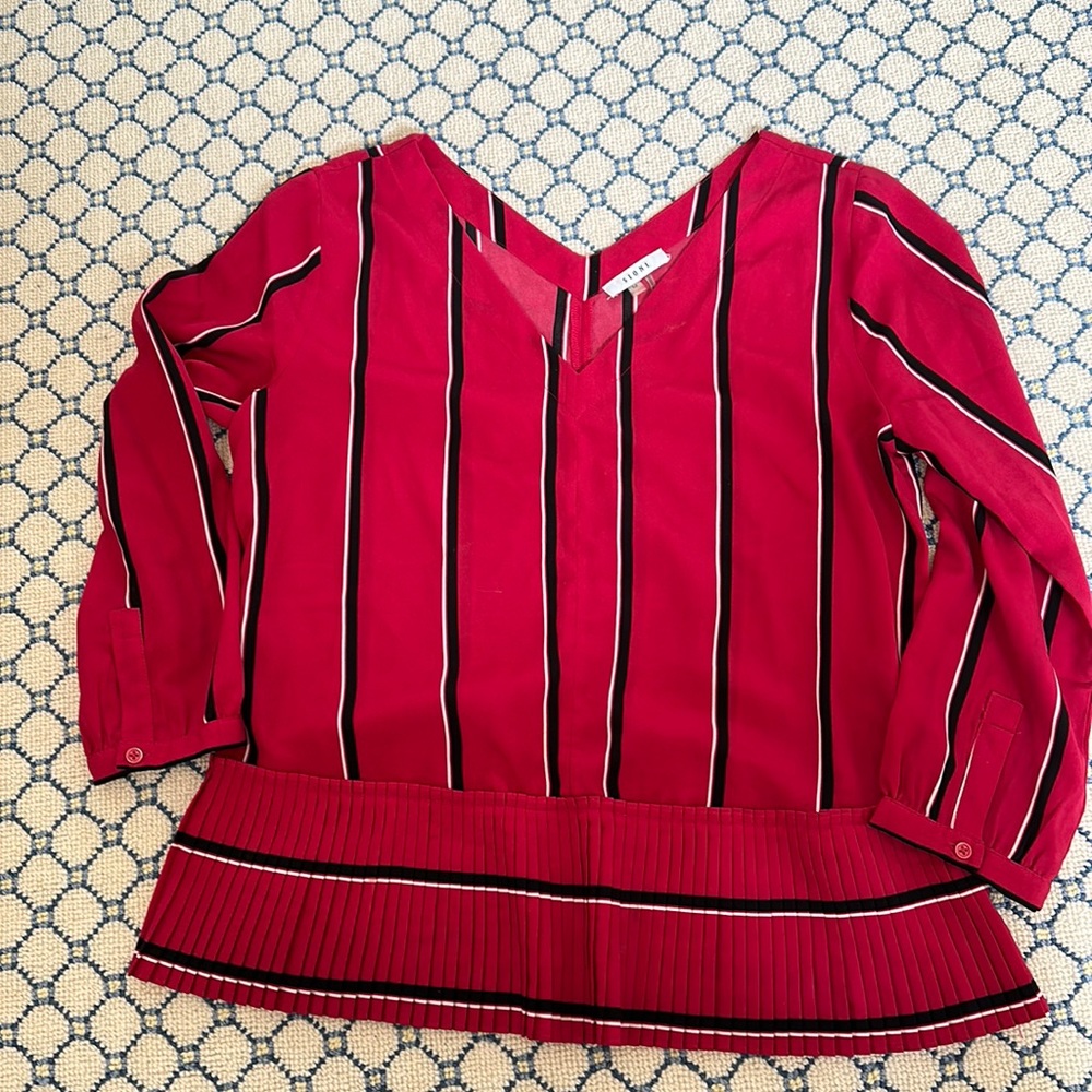 Ladies Sioni red, black and white shirt in size medium.